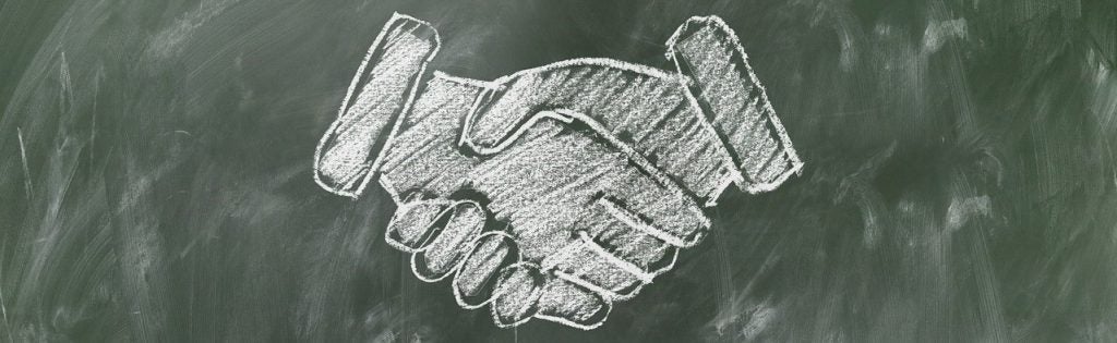 chalk drawing of handshake