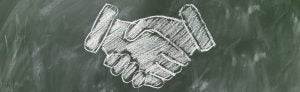 chalk drawing of handshake