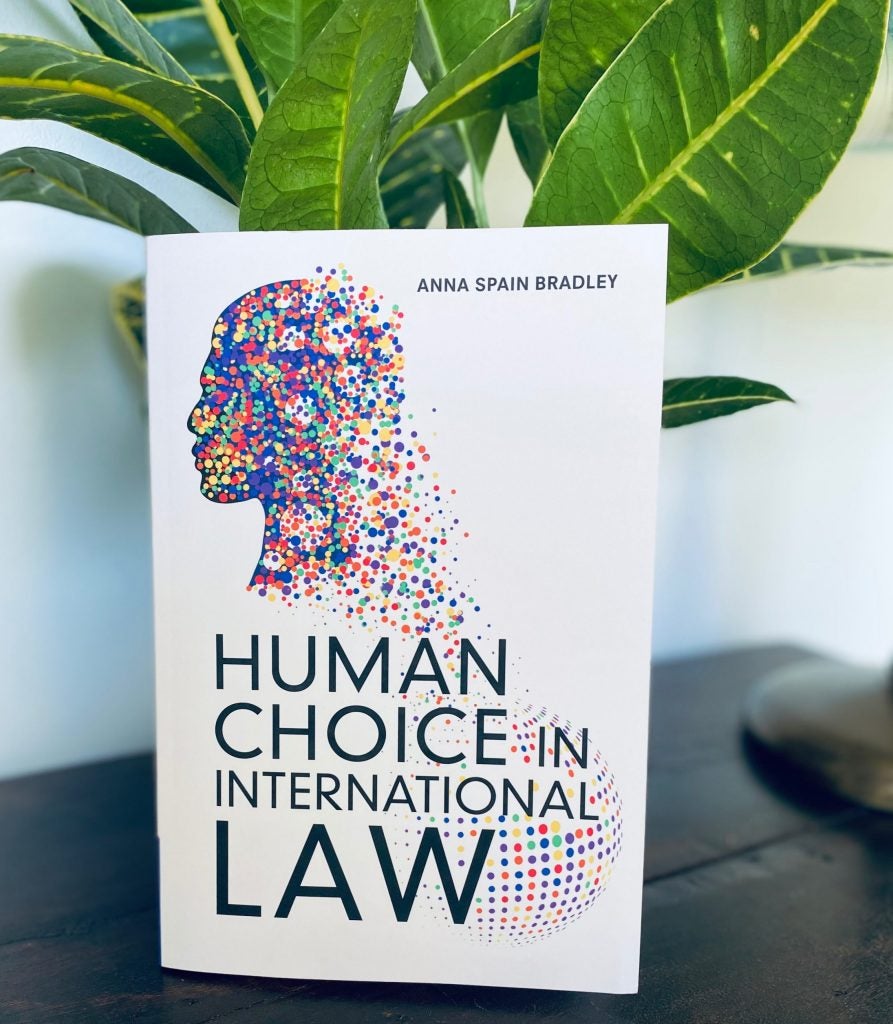 hard copy of vc anna spain bradley's book, human choice in international law by a houseplant