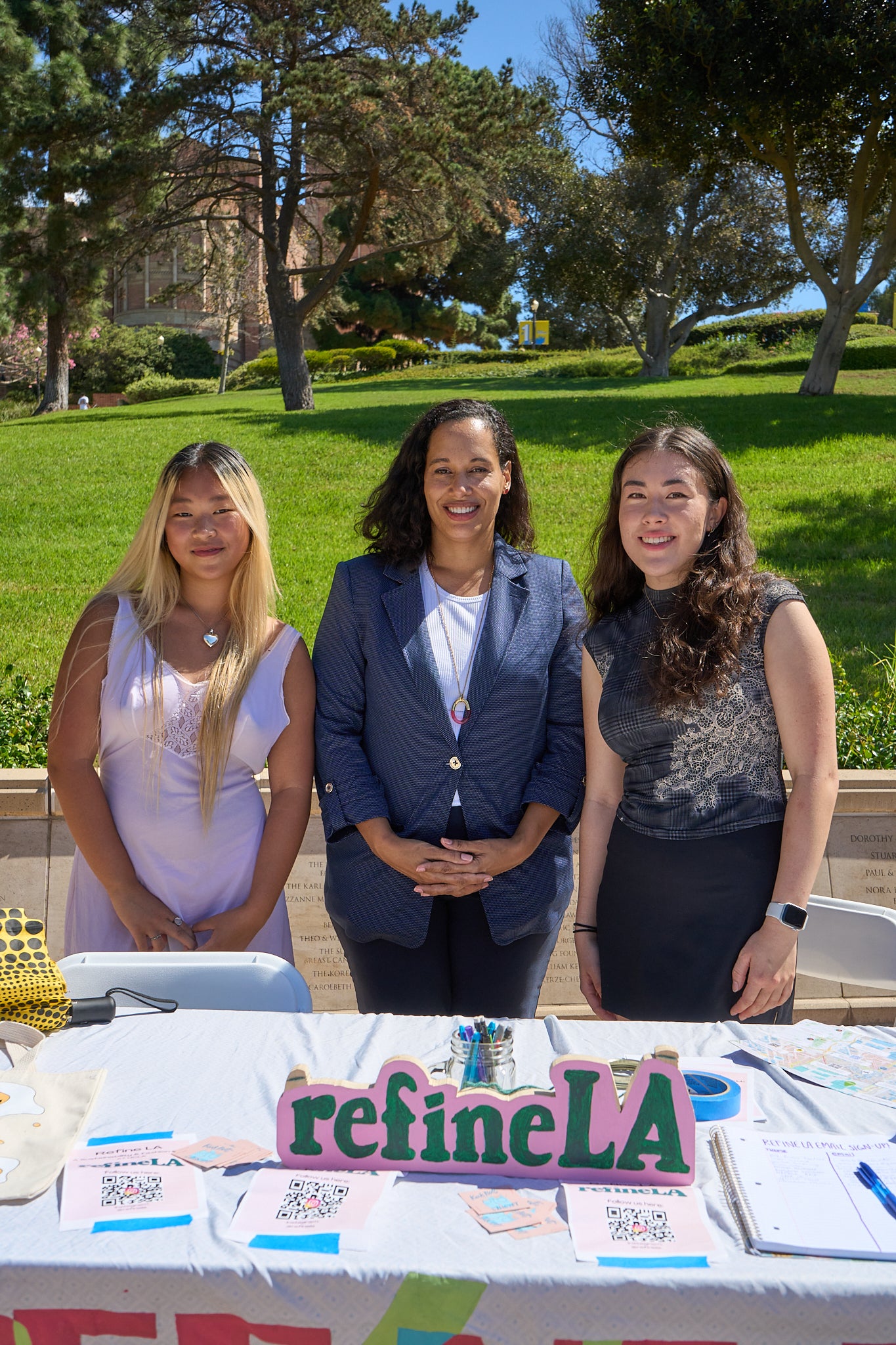 vc spain bradley with ucla refinela representatives at the 2022 ucla enormous activities fair